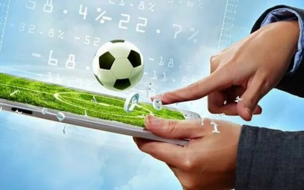 alt text: Người chơi phân tích dữ liệu trước khi đặt cược